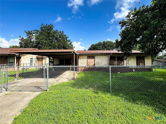 1606 Milam Dr, Victoria, TX 77901 - view of front of house with a carport