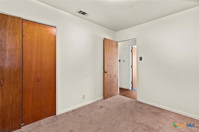 201 S Barbara St, Waco, TX 76705 - unfurnished bedroom featuring carpet flooring and a closet