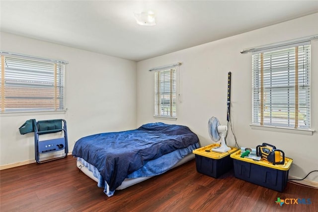 201 S Barbara St, Waco, TX 76705 - bedroom with wood finished floors