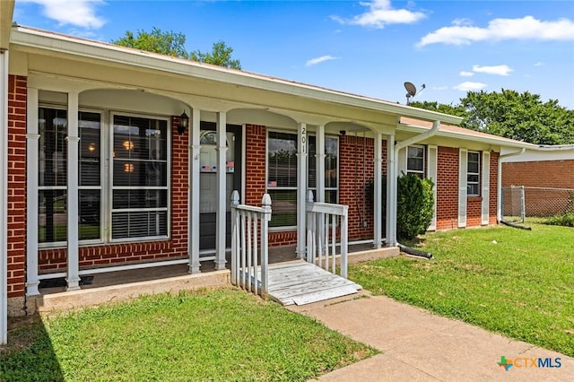 201 S Barbara St, Waco, TX 76705 - entrance to property featuring brick siding and covered porch