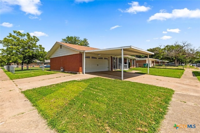 201 S Barbara St, Waco, TX 76705 - view of front of house featuring driveway, a carport, a garage, and brick siding