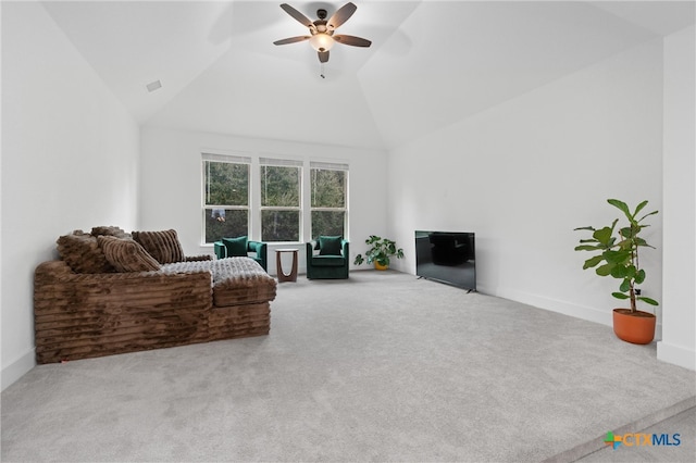 living room featuring light carpet, high vaulted ceiling, and ceiling fan