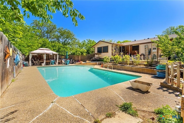 612 S 1st St, Copperas Cove, TX 76522 - view of pool featuring a gazebo, a patio, and a fenced backyard