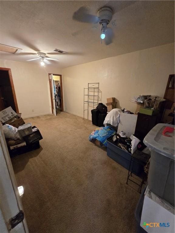 612 S 1st St, Copperas Cove, TX 76522 - carpeted living area with a ceiling fan and a textured ceiling