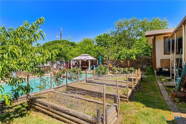 612 S 1st St, Copperas Cove, TX 76522 - fenced backyard featuring a gazebo and a garden