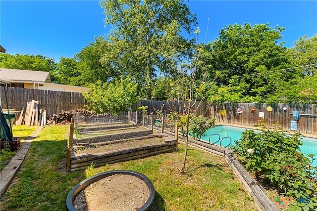 612 S 1st St, Copperas Cove, TX 76522 - view of pool featuring a fenced backyard and a vegetable garden