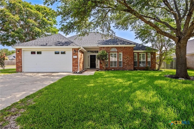 816 Woodhollow Dr, Temple, TX 76502 - view of front of house with an attached garage, brick siding, driveway, and roof with shingles