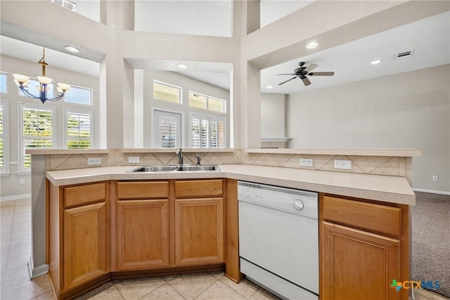 816 Woodhollow Dr, Temple, TX 76502 - kitchen featuring white dishwasher, healthy amount of natural light, light countertops, a chandelier, and recessed lighting