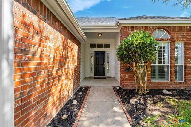 816 Woodhollow Dr, Temple, TX 76502 - view of exterior entry with brick siding