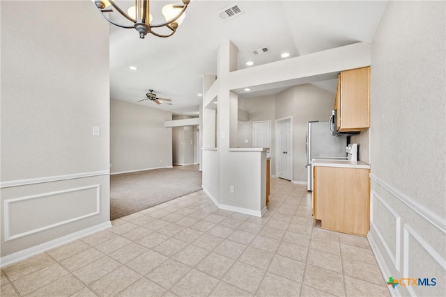 816 Woodhollow Dr, Temple, TX 76502 - kitchen with a chandelier, light countertops, light brown cabinetry, recessed lighting, and open floor plan