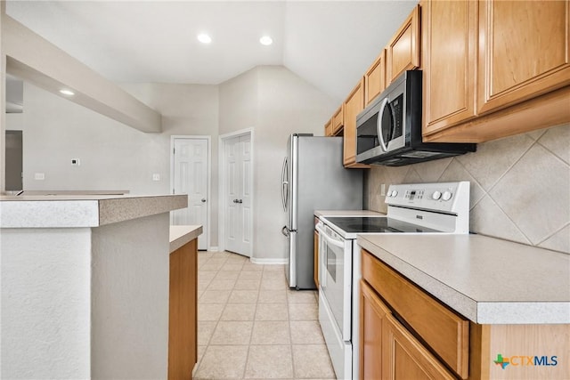 816 Woodhollow Dr, Temple, TX 76502 - kitchen featuring stainless steel appliances, light countertops, recessed lighting, light tile patterned floors, and backsplash