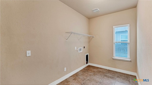 clothes washing area featuring hookup for an electric dryer, hookup for a washing machine, and plenty of natural light