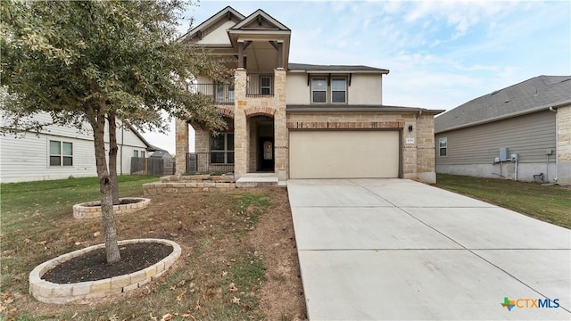 view of front of property with a front lawn and a garage