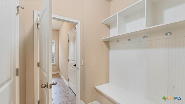 mudroom featuring light tile patterned flooring