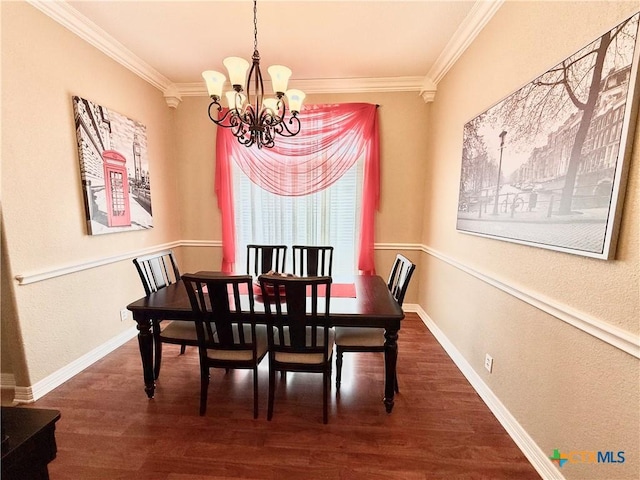 dining space with ornamental molding, a notable chandelier, and dark hardwood / wood-style flooring