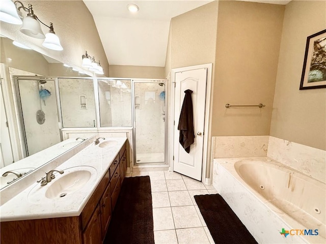 bathroom with tile patterned floors, lofted ceiling, shower with separate bathtub, and vanity