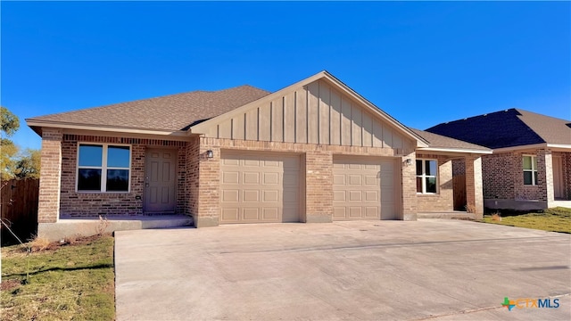 view of front of home with a garage