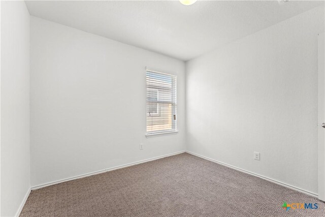 1032 Sandwell Ct, Seguin, TX 78155 - empty room featuring baseboards and carpet flooring