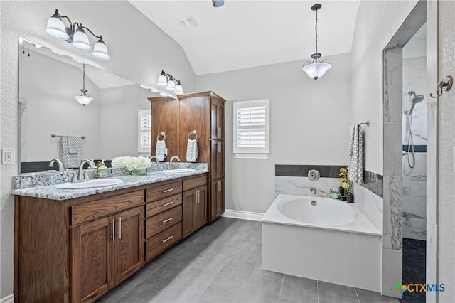 3631 Morgan Mill Rd, Kempner, TX 76539 - bathroom featuring a bath, vaulted ceiling, double vanity, and walk in shower
