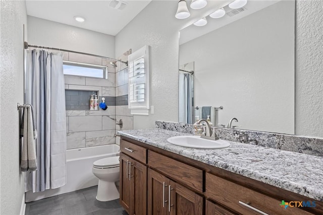 3631 Morgan Mill Rd, Kempner, TX 76539 - bathroom featuring vanity, shower / bath combo with shower curtain, and a textured wall