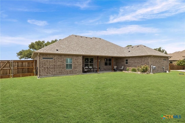 3631 Morgan Mill Rd, Kempner, TX 76539 - rear view of property featuring a fenced backyard, brick siding, a patio, and a shingled roof