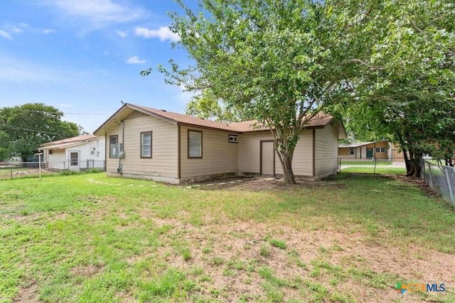 2410 Meadow Ln, Copperas Cove, TX 76522 - rear view of property featuring a fenced backyard and a garage