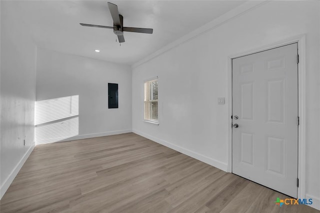 51 Private Road 901, Florence, TX 76527 - spare room with light wood-type flooring, a ceiling fan, and electric panel