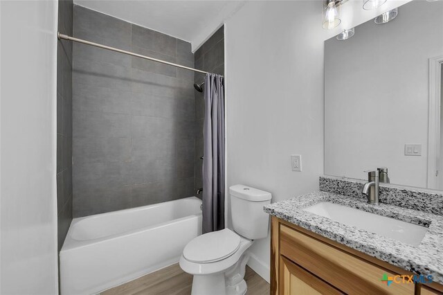51 Private Road 901, Florence, TX 76527 - full bath with vanity, shower / bathtub combination with curtain, and wood finished floors