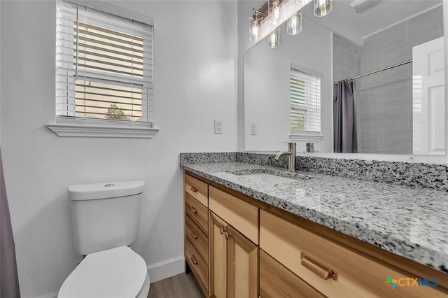 51 Private Road 901, Florence, TX 76527 - bathroom with vanity, curtained shower, and wood finished floors