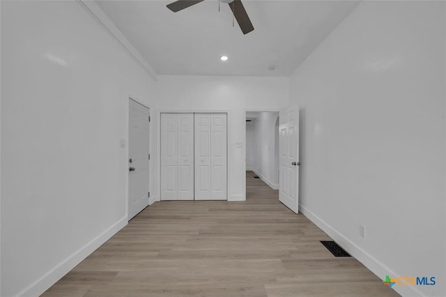 51 Private Road 901, Florence, TX 76527 - unfurnished bedroom with a closet, recessed lighting, light wood-style floors, and a ceiling fan