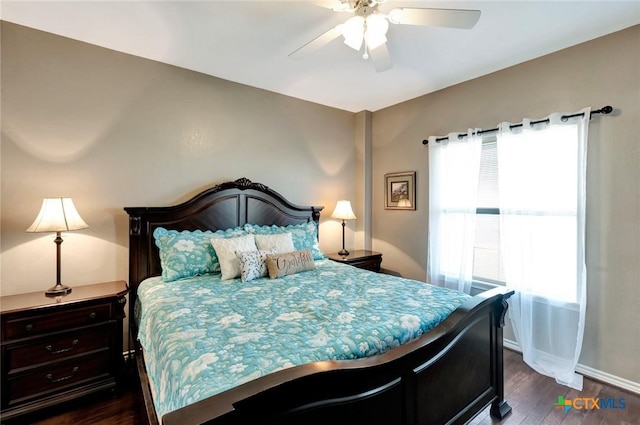 314 Windswept Dr, Port Lavaca, TX 77979 - bedroom with dark wood-type flooring and a ceiling fan