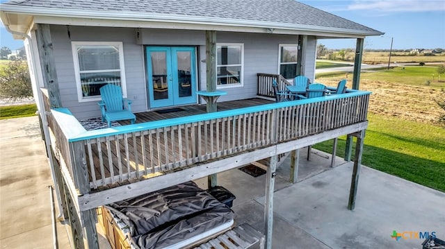 314 Windswept Dr, Port Lavaca, TX 77979 - view of patio with french doors and a deck