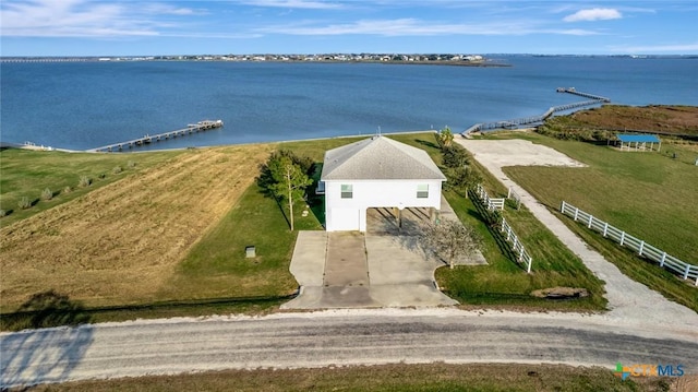 drone / aerial view featuring a water view