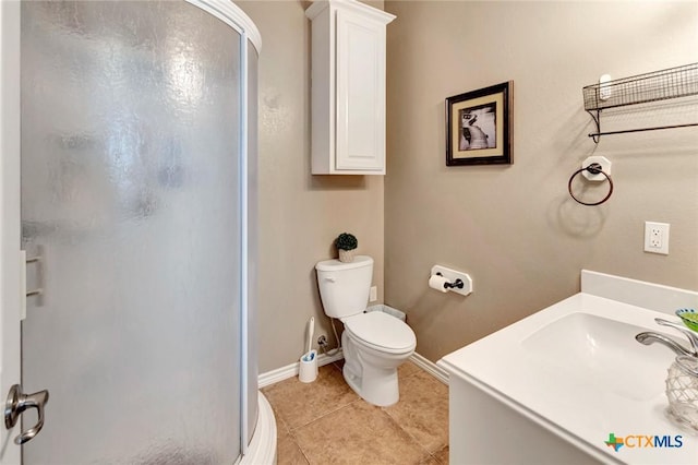 314 Windswept Dr, Port Lavaca, TX 77979 - bathroom featuring a shower stall, vanity, and tile patterned flooring