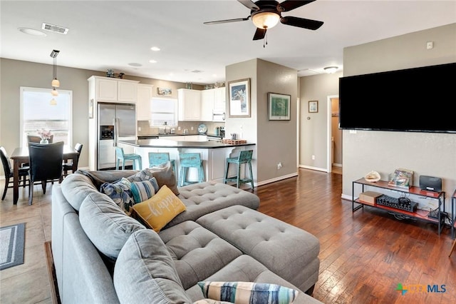 314 Windswept Dr, Port Lavaca, TX 77979 - living room with a ceiling fan, dark wood-style floors, and recessed lighting