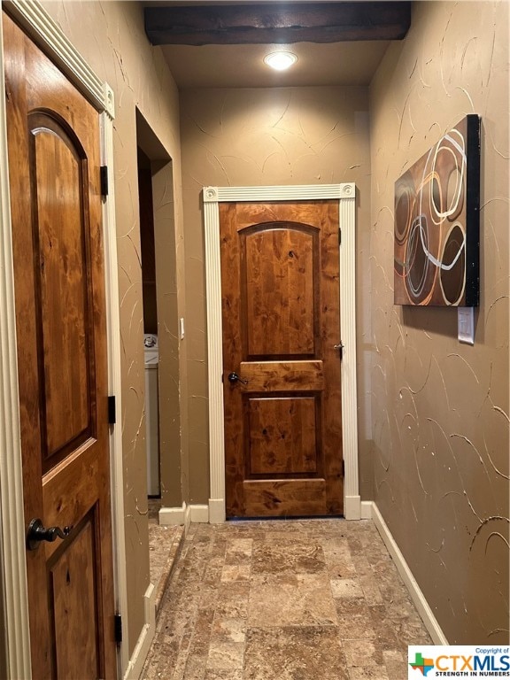 doorway featuring washer / clothes dryer