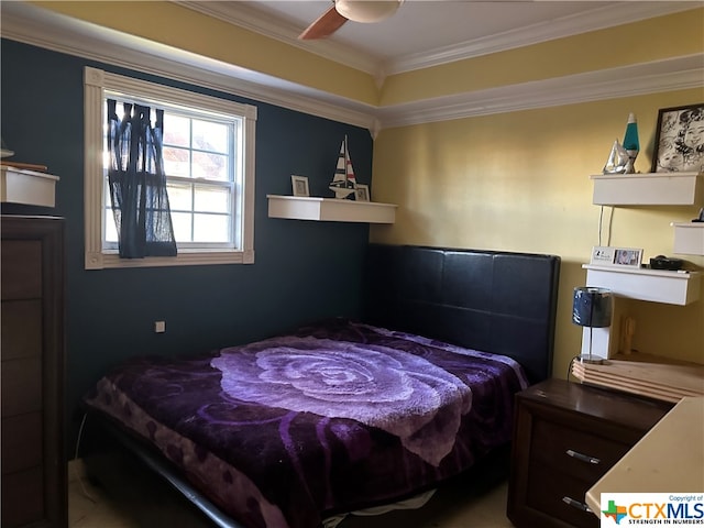 bedroom featuring ornamental molding and ceiling fan