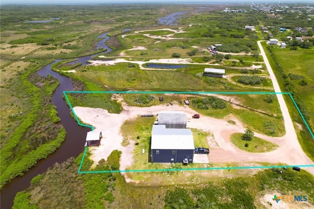 174 Riley Ln, Port Oconnor, TX 77982 - aerial overview of property's location with a large body of water and property boundaries highlighted