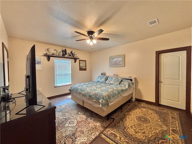 174 Riley Ln, Port Oconnor, TX 77982 - bedroom with baseboards and ceiling fan