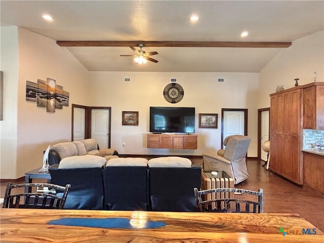 174 Riley Ln, Port Oconnor, TX 77982 - living room featuring a ceiling fan, beamed ceiling, dark wood-type flooring, and baseboards