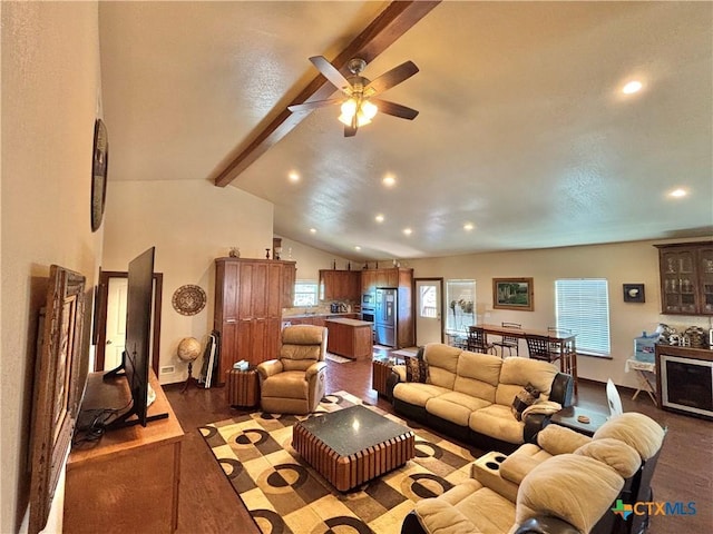 174 Riley Ln, Port Oconnor, TX 77982 - living room featuring beamed ceiling, recessed lighting, dark wood-style flooring, ceiling fan, and baseboards