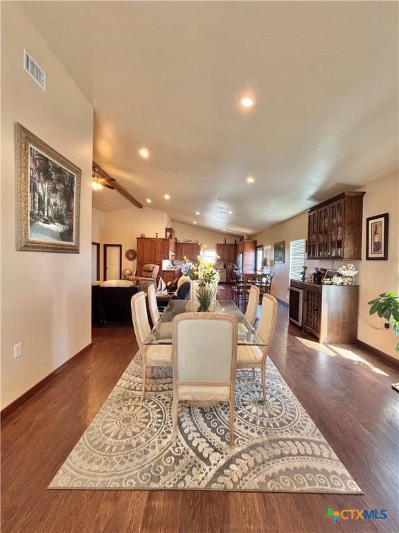 174 Riley Ln, Port Oconnor, TX 77982 - dining area featuring wood finished floors, baseboards, vaulted ceiling, recessed lighting, and ceiling fan
