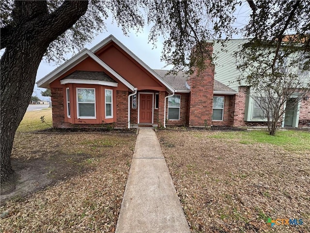 view of front of home with a front yard