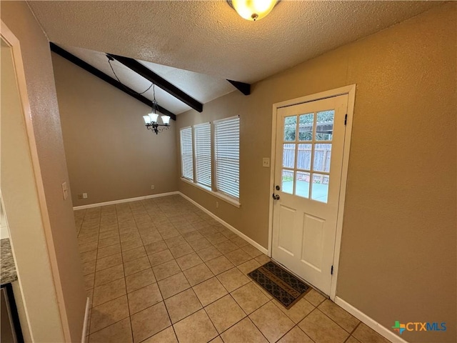 doorway to outside featuring a textured ceiling, vaulted ceiling, an inviting chandelier, and light tile patterned flooring