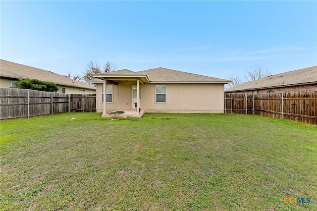 113 Altamont St, Hutto, TX 78634 - rear view of property with a patio area
