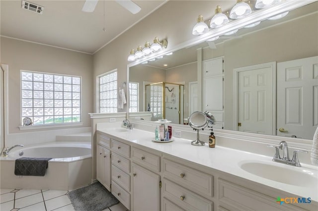 bathroom featuring independent shower and bath, vanity, ornamental molding, ceiling fan, and tile patterned floors