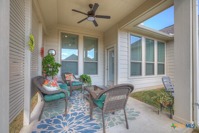 view of patio / terrace featuring ceiling fan