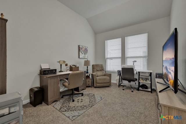 office featuring lofted ceiling and light colored carpet