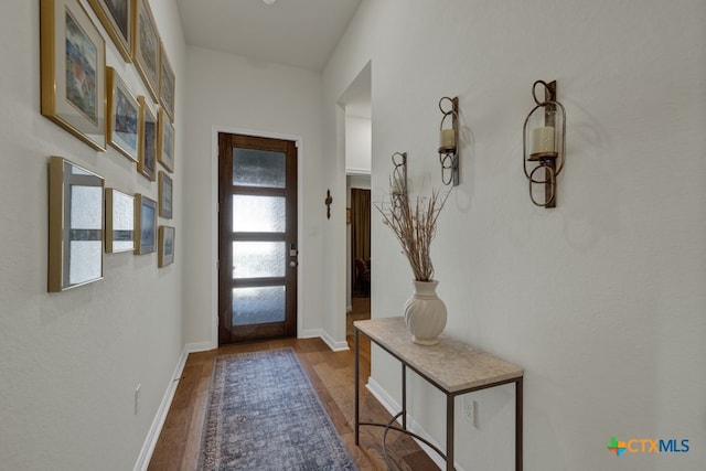 interior space with hardwood / wood-style flooring