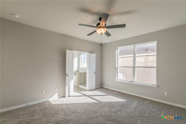 unfurnished bedroom with light carpet and ceiling fan